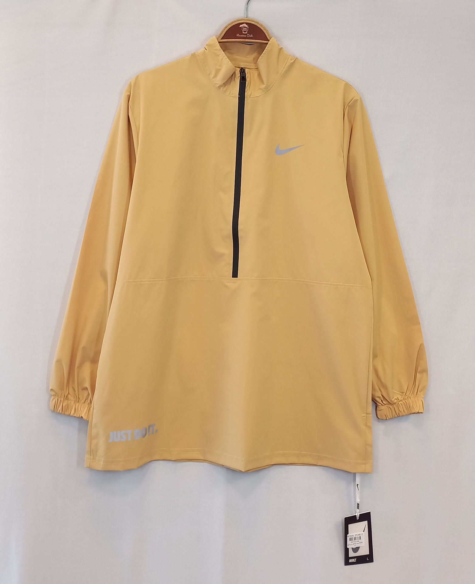 ست ورزشی بادگیر و شلوار زنانه