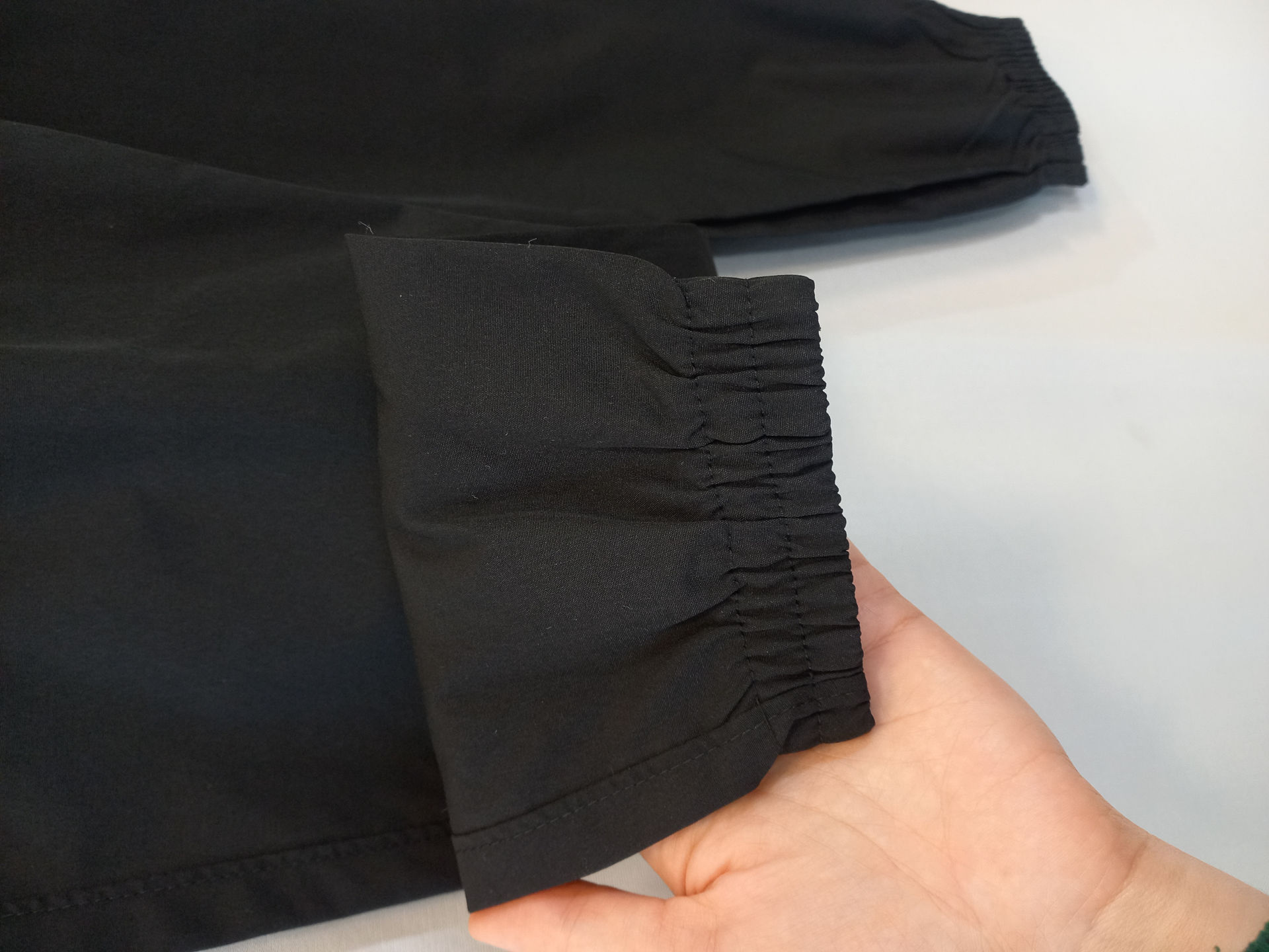 ست ورزشی بادگیر و شلوار زنانه